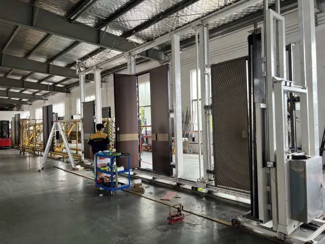 Door production and finishing equipment in the KEST Door workshop.
