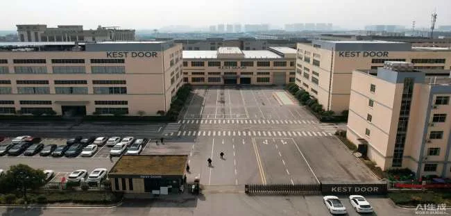 Aerial view of the KEST Door facility and surrounding manufacturing buildings.